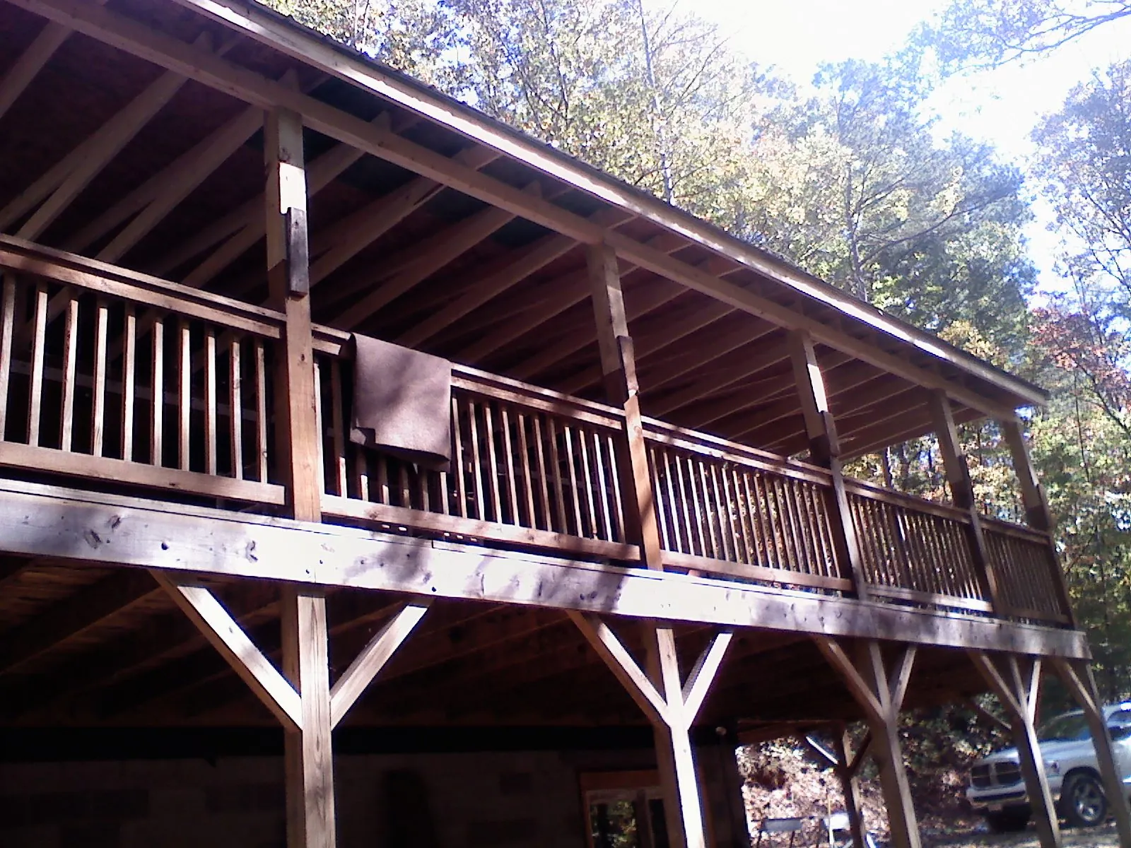 Timber framing under a new elevated porch and deck — Roof Leak Repair in Lovilia by Roofing Brothers